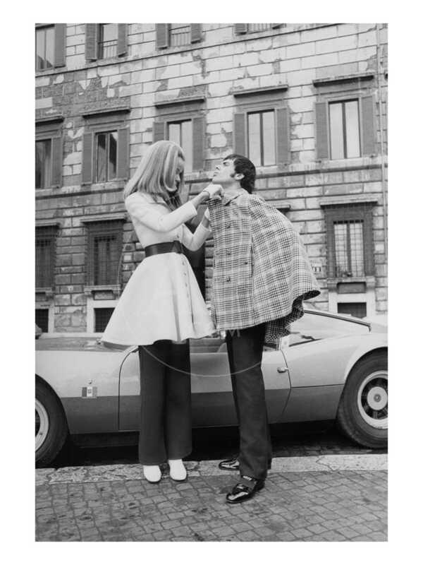 Vogue - April 1969 - Veruschka Adjusts Tomas Milian's Cape