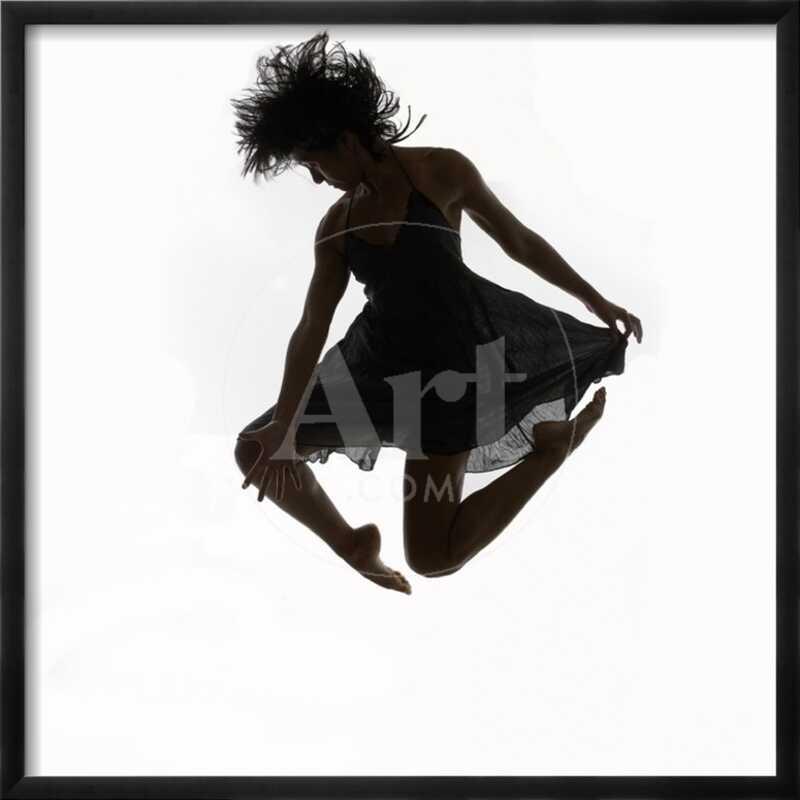 Woman Jumping in the Air Dancing - Framed Photographic Print