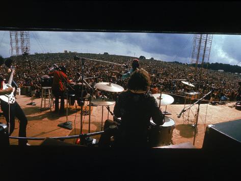 Huge Crowd Listening to a Band Onstage at the Woodstock Music and Art Festival Photographic Print