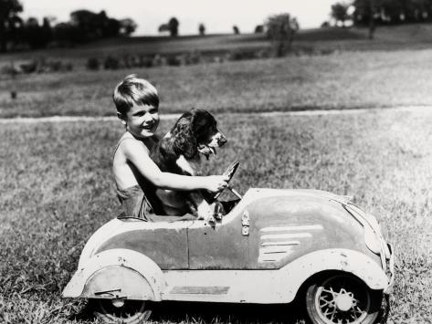 h-armstrong-roberts-boy-driving-toy-car-with-springer-spaniel-dog-in-his-lap_i-G-56-5630-R86MG00Z.jpg