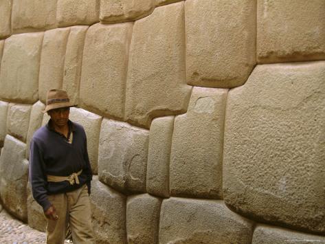 oliviero-olivieri-man-walking-alongside-inca-wall-cuzco-unesco-world-heritage-site-peru-south-america_i-G-26-2613-28RVD00Z.jpg