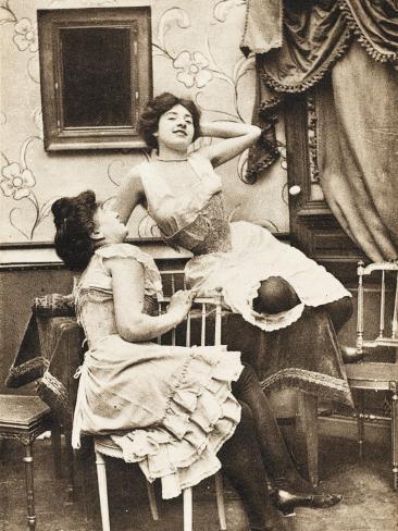 Two Parisian Prostitutes Sit, One on a Table, and Chat Pose and