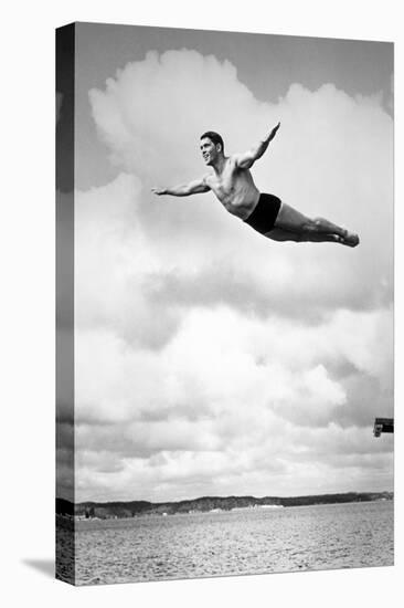 1930s MAN SWAN DIVING FROM HIGH DIVING BOARD OUTDOOR-H. Armstrong Roberts-Premier Image Canvas