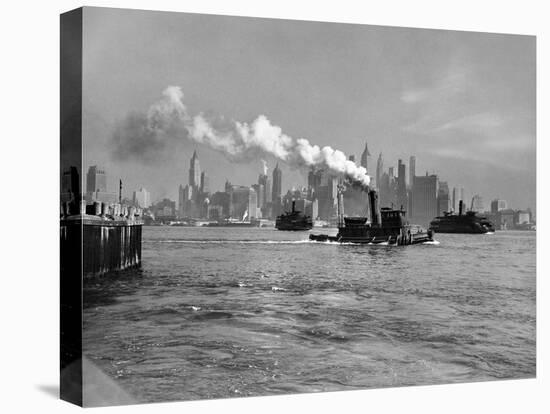 1933 Steam Engine Tug Boat and Staten Island Ferry Boats on Hudson River Against Manhattan-null-Premier Image Canvas