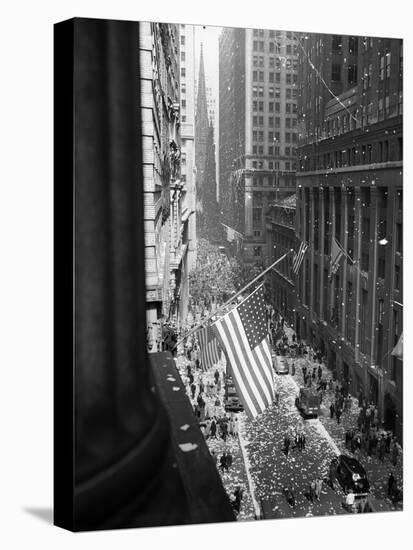 1945 Aerial View of VE Day Celebration on Wall Street NYC with Flags and Confetti Flying-null-Premier Image Canvas