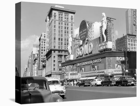 1950s New York City Times Square with Massive Bond Clothing Sign Between 44th and 45th Streets-null-Premier Image Canvas