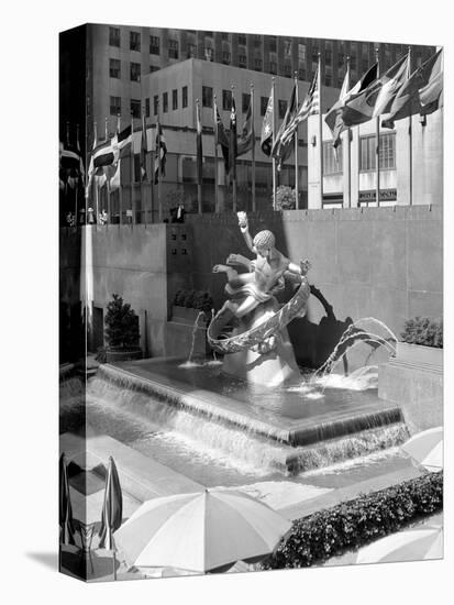1950s Rockefeller Center Prometheus Fountain and United Nations Flags New York City-null-Premier Image Canvas