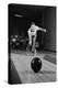 1960s MAN RELEASING BALL DOWN BOWLING ALLEY LANE-H. Armstrong Roberts-Premier Image Canvas