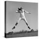 1960s QUARTERBACK JUMPING AND THROWING PASS FOOTBALL-H. Armstrong Roberts-Premier Image Canvas