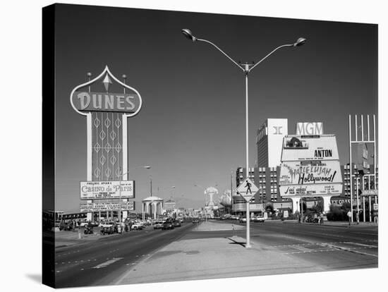 1980s Daytime the Strip with Signs for the Dunes Mgm Flamingo Las Vegas, Nevada-null-Premier Image Canvas