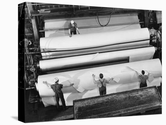 20 Ft. Roll of Finished Paper Arriving on the Rewinder, Ready to Be Cut and Shipped from Paper Mill-Margaret Bourke-White-Premier Image Canvas