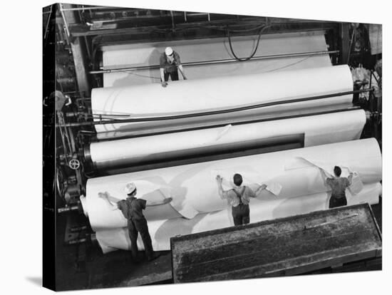 20 Ft. Roll of Finished Paper Arriving on the Rewinder, Ready to Be Cut and Shipped from Paper Mill-Margaret Bourke-White-Premier Image Canvas