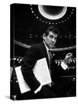 36 Year Old Composer Leonard Bernstein, Holding Musical Score with Lighted Auditorium Behind Him-Gordon Parks-Premier Image Canvas