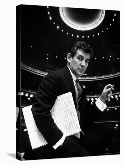 36 Year Old Composer Leonard Bernstein, Holding Musical Score with Lighted Auditorium Behind Him-Gordon Parks-Premier Image Canvas