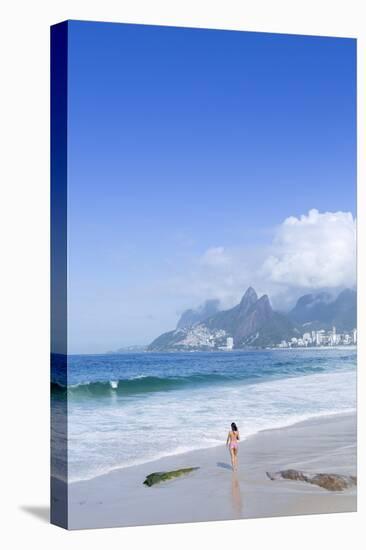 A 20-25 Year Old Young Brazilian Woman on Ipanema Beach with the Morro Dois Irmaos Hills-Alex Robinson-Premier Image Canvas