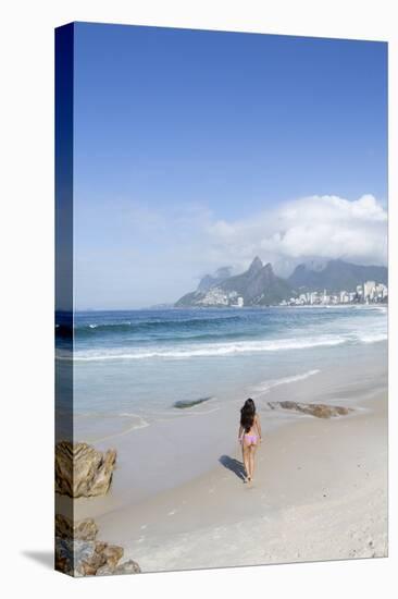 A 20-25 Year Old Young Brazilian Woman on Ipanema Beach with the Morro Dois Irmaos Hills-Alex Robinson-Premier Image Canvas