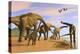 A Brachiosaurus Herd Walks Down a Wet Sandy Beach-null-Stretched Canvas