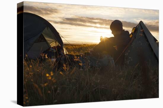 A camper sits in the evening sun, Picws Du, Black Mountain, Brecon Beacons National Park, Wales, Un-Charlie Harding-Premier Image Canvas