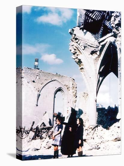 A Catholic Nun and Two Women with Children Standing in Front of the Ruins of Eglise Saint-Malo-null-Premier Image Canvas