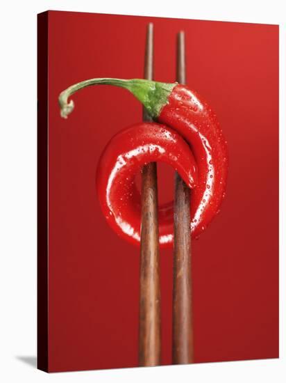 A Chili on Chopsticks-Marc O^ Finley-Premier Image Canvas