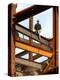 A Construction Worker Stands on a Steel Beam While Working on a High Rise Building-null-Premier Image Canvas