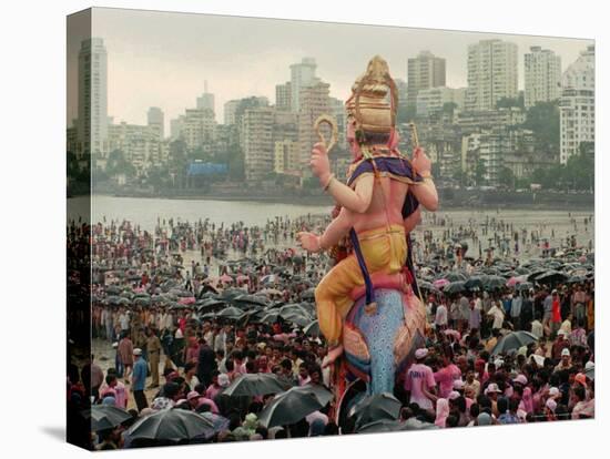 A Crowd of Revellers Carry a Statue of Ganesh-null-Premier Image Canvas