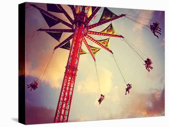 A Fair Ride Shot with a Long Exposure at Dusk Toned with a Retro Vintage Instagram Filter-graphicphoto-Premier Image Canvas