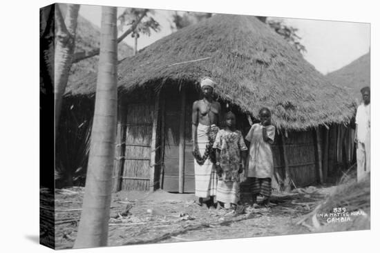 A Family in Front of their Home, Gambia, 20th Century-null-Premier Image Canvas