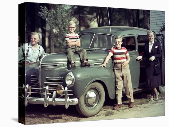 A Family Poses on and around their Plymouth Automobile, Ca. 1953-null-Premier Image Canvas