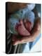 A Father Holding His Baby's Feet-Mitch Diamond-Premier Image Canvas