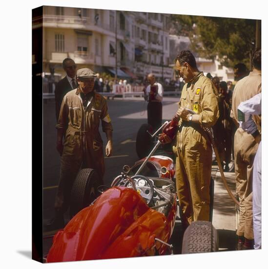 A Ferrari Team Member Filling a Car with Fuel, Monaco Grand Prix, Monte Carlo, 1963-null-Premier Image Canvas