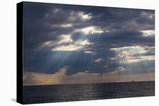 A Fishing Trawler under Storm Clouds at Duck Harbor Beach in Wellfleet, Massachusetts. Cape Cod-Jerry and Marcy Monkman-Premier Image Canvas