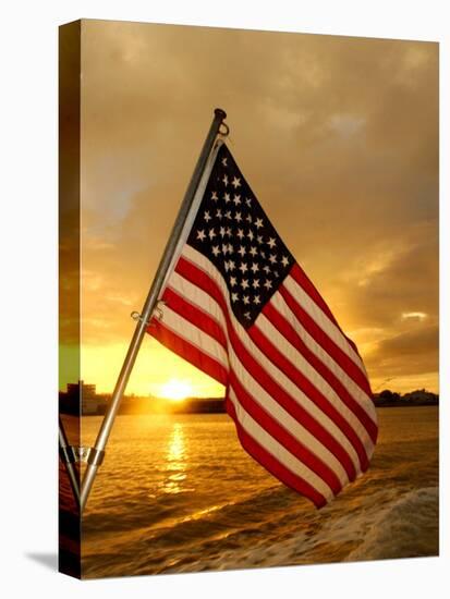 A Flag Waves Over Pearl Harbor as Dawn Breaks-null-Premier Image Canvas