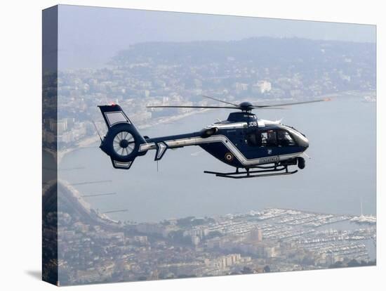 A Gendarme Helicopter is Seen Above the Bay of Cannes-Michel Spingler-Premier Image Canvas