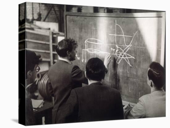 A Group of Scientists Study a Problem by Using Diagrams on a Blackboard-Henry Grant-Premier Image Canvas