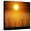 A Group of Wind Turbines are Silhouetted by the Setting Sun-Charlie Riedel-Premier Image Canvas