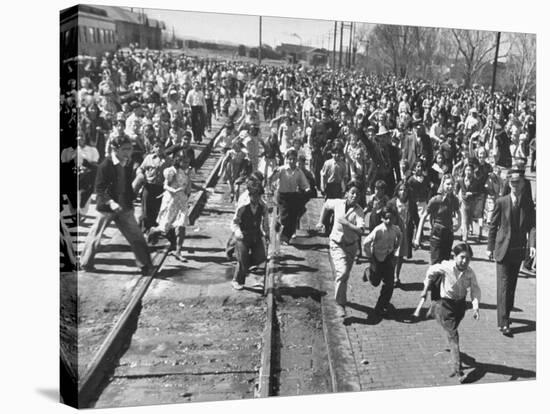 A Large Crowd of People Running Through the Streets During the Dodge City Parade-Peter Stackpole-Premier Image Canvas