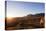 A local man warming up in the morning sun, Andringitra National Park, Ambalavao, central area, Mada-Christian Kober-Premier Image Canvas