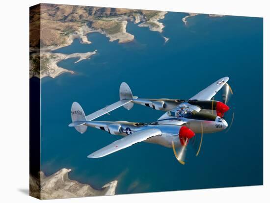 A Lockheed P-38 Lightning Fighter Aircraft in Flight-Stocktrek Images-Premier Image Canvas