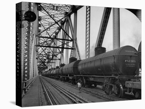 A Long String of Tank Cras Heading across the Huey Long Bridge-null-Premier Image Canvas