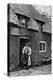 A Man Smoking a Pipe Outside a Shop, Worcestershire, C1922-AW Cutler-Premier Image Canvas