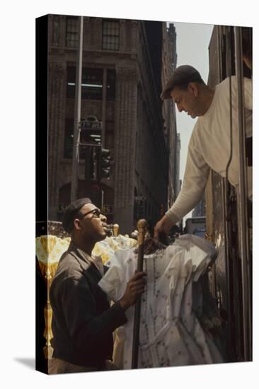 A Pair of Push Boys Unload Racks of Dresses on 7th Avenue, New York, New York, 1960-Walter Sanders-Premier Image Canvas