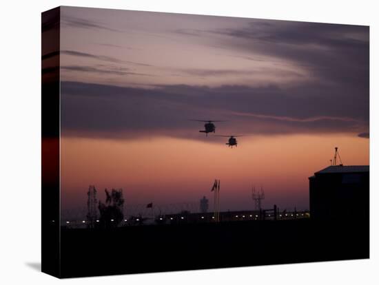 A Pair of UH-60 Black Hawk Helicopters Approach their Landing in Baghdad, Iraq-null-Premier Image Canvas