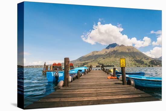 A pier and boat on Lago San Pablo, at the base of Volcan Imbabura, close to the famous market town-Alexandre Rotenberg-Premier Image Canvas