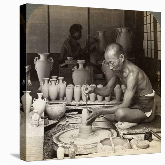 A Potter and His Wheel, Fashioning a Vase of Awata Porcelain, Kinkosan Works, Kyoto, Japan, 1904-Underwood & Underwood-Premier Image Canvas