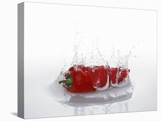 A Red Chilli Pepper Falling into Water-Kröger & Gross-Premier Image Canvas