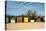 A Row of Beach Changing Huts-Will Wilkinson-Premier Image Canvas