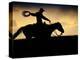 A Silhouetted Cowboy Riding Alone a Ridge at Sunset in Shell, Wyoming, USA-Joe Restuccia III-Premier Image Canvas