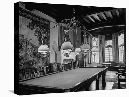 A Six-Lamped Brass Chandelier Hanging over the Pool Table in the Billard Room-null-Premier Image Canvas