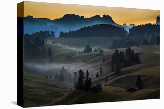 A small village on rolling hills as the sun rises over the Dolomites, Italy-Art Wolfe-Premier Image Canvas